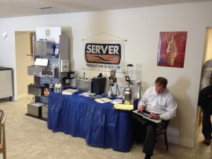 Server Products, Robert Sand/Byrne Reps, preparing a quote for a guest.