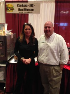 Lisa Gallagher w/Con Agra Foods Sean Reitz w/Rep Group, Acosta Food Service. Displaying their new birthday cake cone coating and other great tasting products